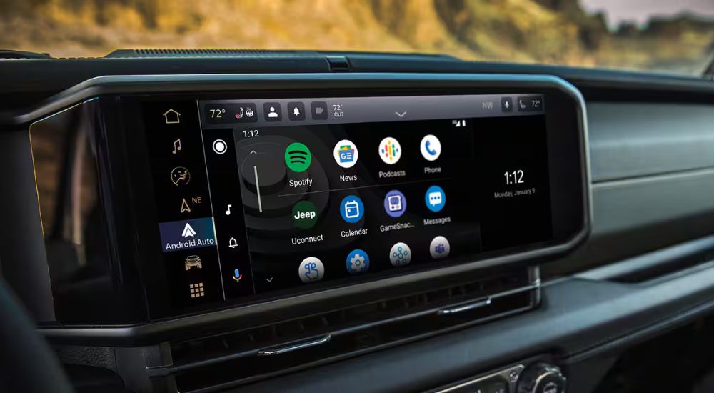 Close-up of the infotainment screen in a 2025 Jeep Wrangler at a Jeep dealer near Peoria.