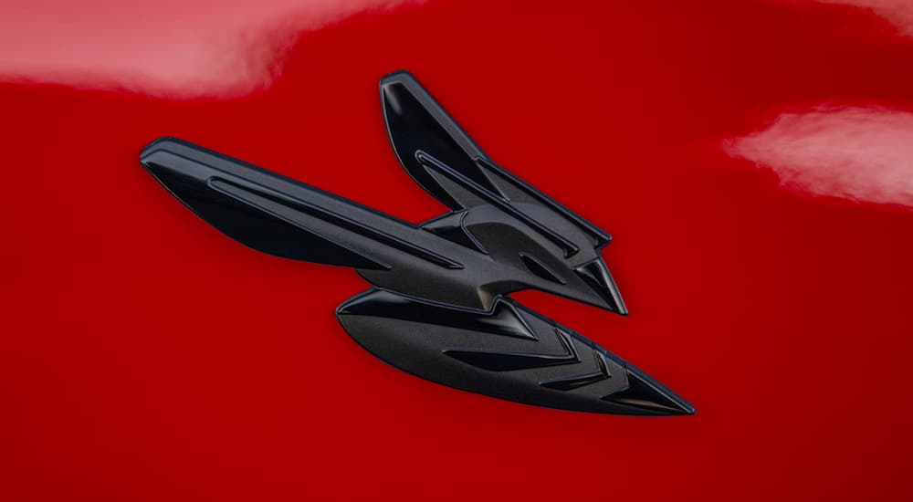 Badge on a red 2025 Dodge Hornet