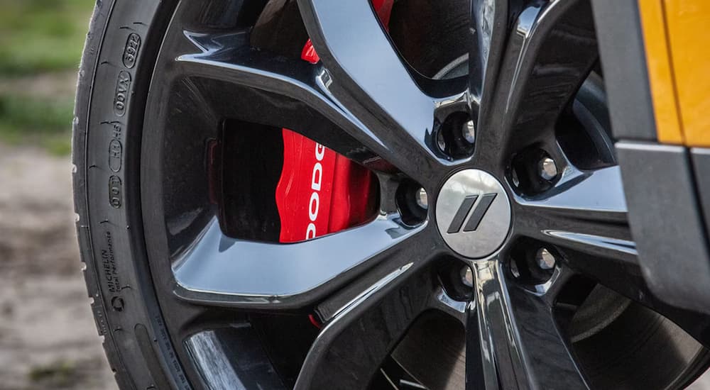 Rim and caliper on a yellow 2025 Dodge Hornet at a Dodge dealer near Peoria