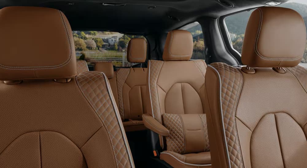 Brown leather interior seating inside a 2025 Chrysler Pacifica for sale