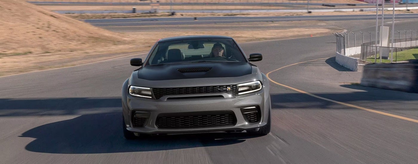 A grey 2023 Dodge Charger Scat Pack is shown from the front.
